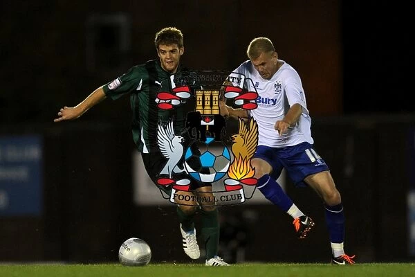 Battling for the Carling Cup: Bishop vs. Cranie at Gigg Lane (Coventry City vs. Bury, Round 1, 2011)