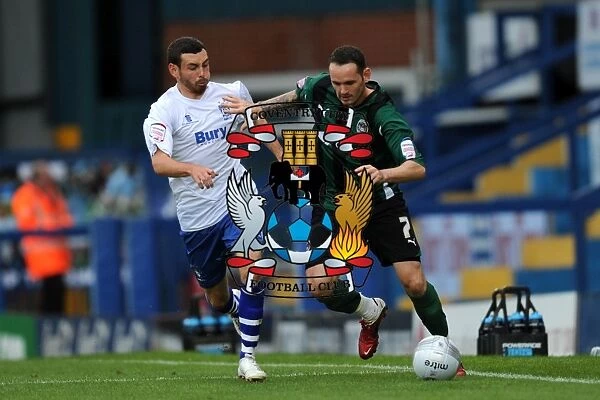 Battling for the Carling Cup: Worrall vs. Bell in the First Round Clash between Bury and Coventry City (2011)