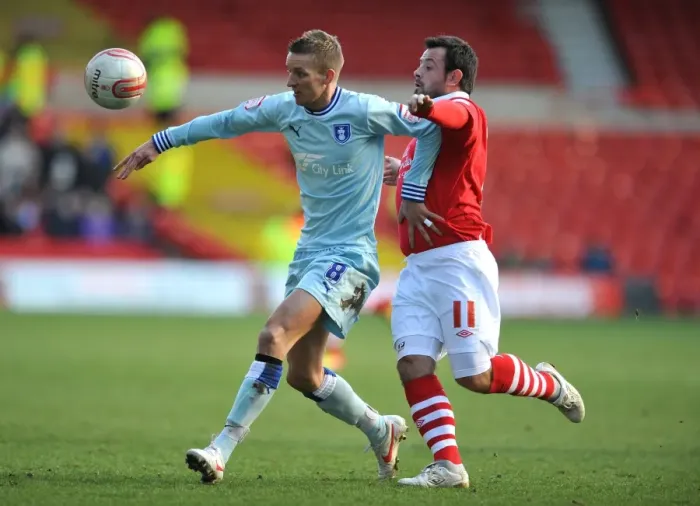 Framed Print : Battling for Championship Supremacy: Reid vs. Baker, Nottingham Forest vs. Coventry City (February 18, 2012) Framed Print : Battling for Championship Supremacy: Reid vs. Baker, Nottingham Forest vs. Coventry City (February 18, 2012)