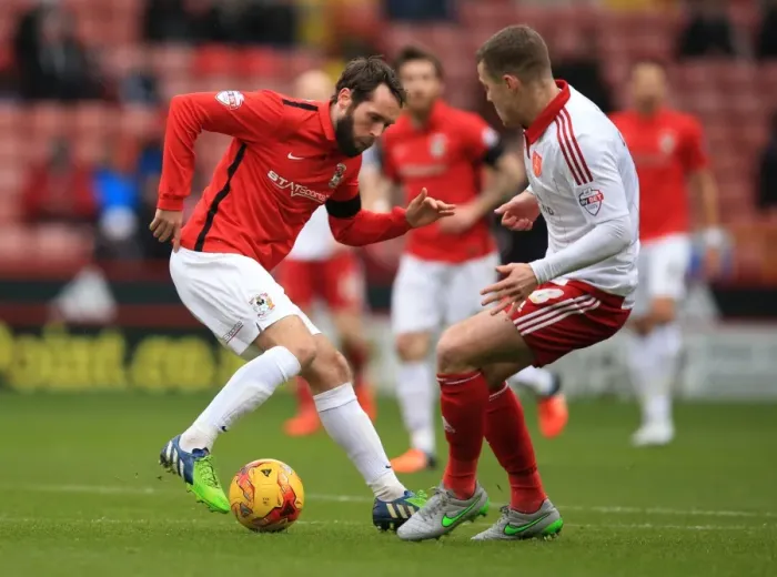 Framed Print : Battling for Control: Coutts vs. O'Brien in Sky Bet League One Showdown Framed Print : Battling for Control: Coutts vs. O'Brien in Sky Bet League One Showdown
