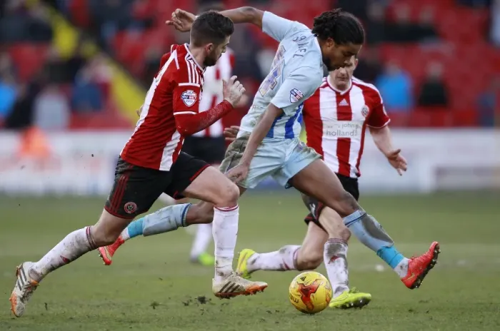 Framed Print : Battling for Control: Harris vs. Samuel - Sheffield United vs. Coventry City Football Rivalry Framed Print : Battling for Control: Harris vs. Samuel - Sheffield United vs. Coventry City Football Rivalry