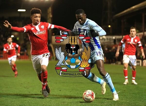 Battling for Control: Holgate vs. Nouble in Sky Bet League One Clash at Oakwell