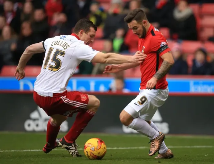 Framed Print : Battling for Control: Neill Collins vs. Adam Armstrong in Sky Bet League One Clash at Bramall Lane Framed Print : Battling for Control: Neill Collins vs. Adam Armstrong in Sky Bet League One Clash at Bramall Lane