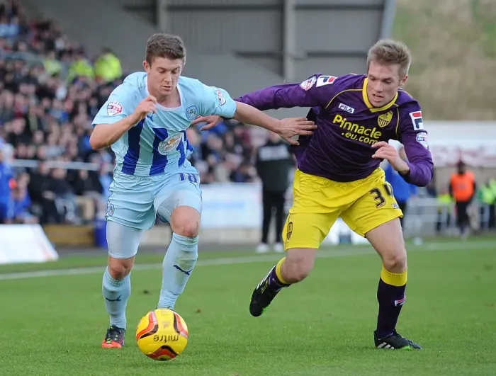Framed Print : Battling for Control: Phillips vs. Holt in Coventry vs. Notts County League One Clash Framed Print : Battling for Control: Phillips vs. Holt in Coventry vs. Notts County League One Clash