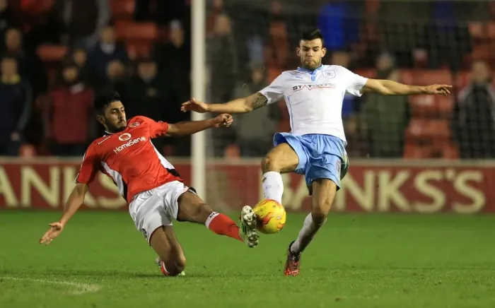 Framed Print : Battling for the FA Cup: A Clash between Mal Benning and Conor Thomas at Bescot Stadium Framed Print : Battling for the FA Cup: A Clash between Mal Benning and Conor Thomas at Bescot Stadium