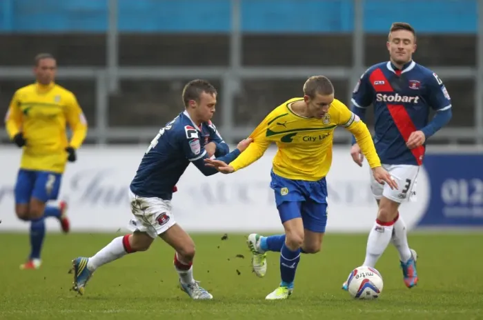 Framed Print : Battling for Supremacy: Chantler vs. Baker in Npower League One Clash Framed Print : Battling for Supremacy: Chantler vs. Baker in Npower League One Clash