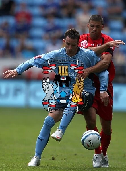 Battling for Supremacy: McIndoe vs. Walters in the Coca-Cola Championship Clash between Coventry City and Ipswich Town (09-08-2009)
