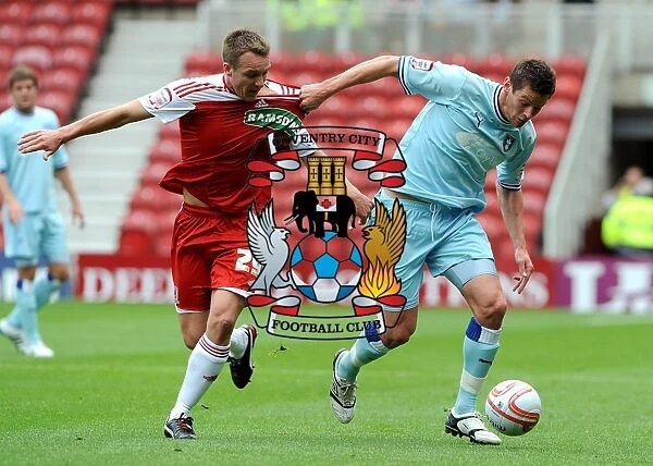 Battling for Supremacy: McMahon vs. Jutkiewicz in the Npower Championship Clash between Middlesbrough and Coventry City