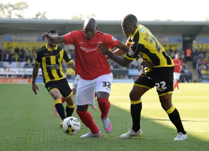 Framed Print : Binnom-Williams vs. Fortune: A Fierce Tackle in Sky Bet League One Clash between Burton Albion and Coventry City Framed Print : Binnom-Williams vs. Fortune: A Fierce Tackle in Sky Bet League One Clash between Burton Albion and Coventry City