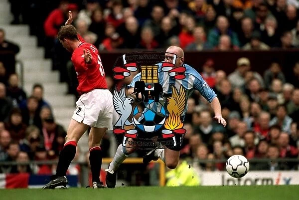 Butt Heads: A Tense Moment Between Nicky Butt and John Hartson in the FA Carling Premiership Clash at Old Trafford (14-04-2001)