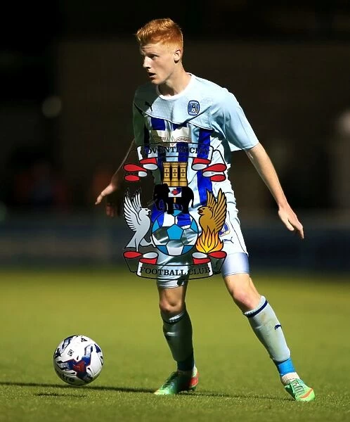 Capital One Cup First Round: Ryan Haynes of Coventry City Faces Off Against Cardiff City at Sixfields Stadium