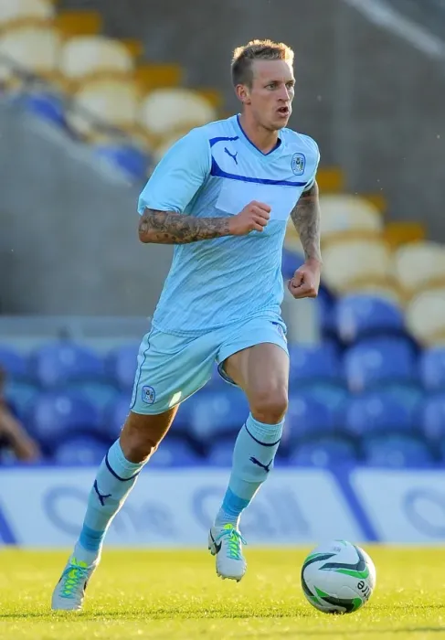 Framed Print : Carl Baker in Action: Coventry City's Star Midfielder at Mansfield Town Friendly, July 2013 Framed Print : Carl Baker in Action: Coventry City's Star Midfielder at Mansfield Town Friendly, July 2013