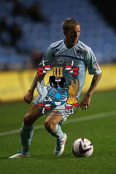 Carl Baker Fights for Coventry City in Capital One Cup Clash Against Birmingham City at Ricoh Arena
