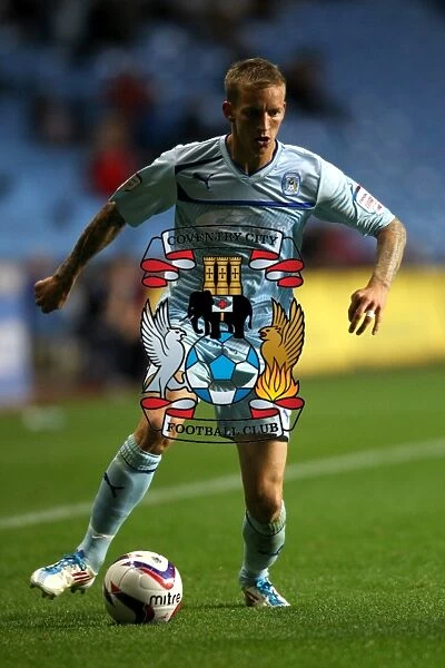 Carl Baker Fights for Coventry City in Intense Capital One Cup Clash vs. Birmingham City at Ricoh Arena