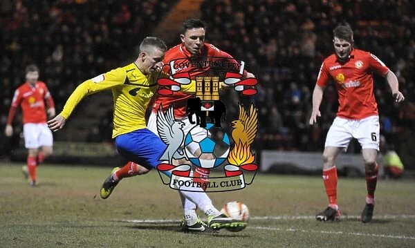 Carl Baker's Determined Shot: Coventry City's Johnstones Paint Trophy Battle at Crewe Alexandra