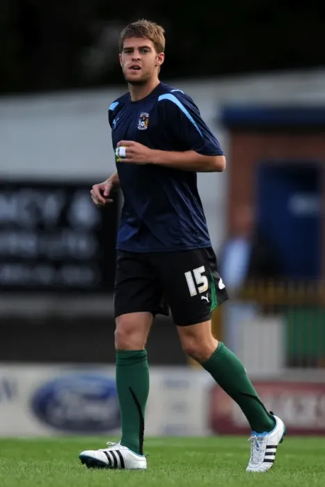 Framed Print : Carling Cup First Round Showdown: Coventry City FC vs Bury at Gigg Lane - Martin Cranie's Determined Performance Framed Print : Carling Cup First Round Showdown: Coventry City FC vs Bury at Gigg Lane - Martin Cranie's Determined Performance