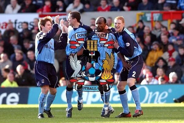Celebrating Glory: Coventry City's Patrick Suffo and Teams Ecstatic Reaction to Winning Goal vs. Nottingham Forest (Nationwide League Division One, 07-02-2004)