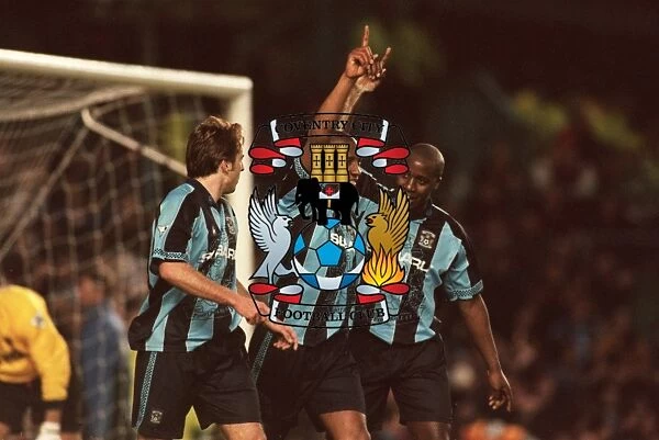 Celebrating the Penalty: Coventry City's Triumph - Huckerby, Williams, and Dublin Rejoice