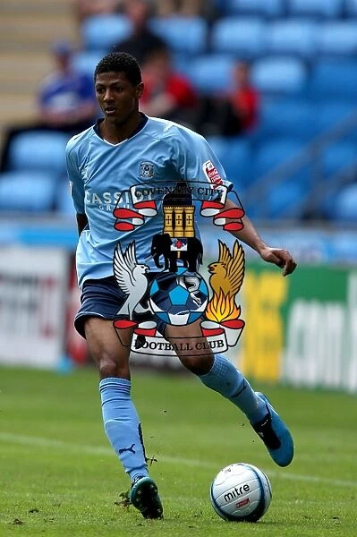 Championship Showdown at Ricoh Arena: Coventry City vs Ipswich Town (2009) - Patrick Van Aanholt in Action