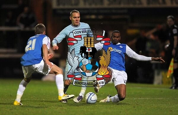 Chris Hussey vs. Daniel Kearns and Emile Sinclair: Intense Battle in Coventry City vs. Peterborough United Npower Championship Clash