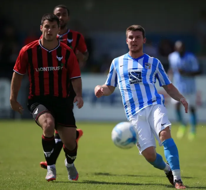 Framed Print : Chris Stokes vs Patrick Hoban: A Riveting Clash at Coventry City's Liberty Way Stadium - Coventry City vs Oxford United Pre-Season Friendly Framed Print : Chris Stokes vs Patrick Hoban: A Riveting Clash at Coventry City's Liberty Way Stadium - Coventry City vs Oxford United Pre-Season Friendly