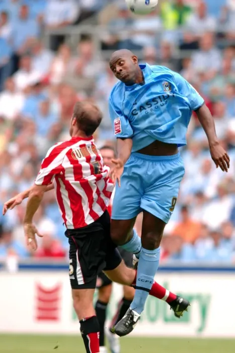 Framed Print : Clash in the Championship: Coventry City vs. Sunderland - Dele Adebola vs. Kenny Cunningham Aerial Battle (Ricoh Arena, 2006) Framed Print : Clash in the Championship: Coventry City vs. Sunderland - Dele Adebola vs. Kenny Cunningham Aerial Battle (Ricoh Arena, 2006)