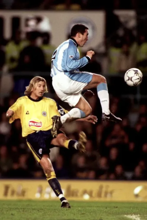 Framed Print : Clash at the Coventry Stadium: Coventry City vs. Leicester City - Savage Tackle on Telfer (Premier League, 10-12-2000) Framed Print : Clash at the Coventry Stadium: Coventry City vs. Leicester City - Savage Tackle on Telfer (Premier League, 10-12-2000)