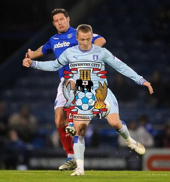 Clash at Fratton Park: McSheffrey vs. Norris - Coventry City's Championship Showdown with Portsmouth (December 3, 2011)