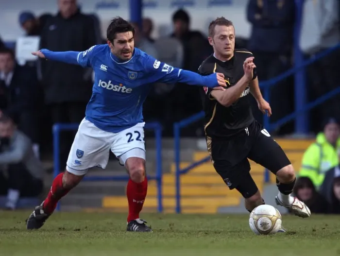Framed Print : Clash at Fratton Park: Sammy Clingan vs. Richard Hughes in FA Cup Third Round Showdown Framed Print : Clash at Fratton Park: Sammy Clingan vs. Richard Hughes in FA Cup Third Round Showdown