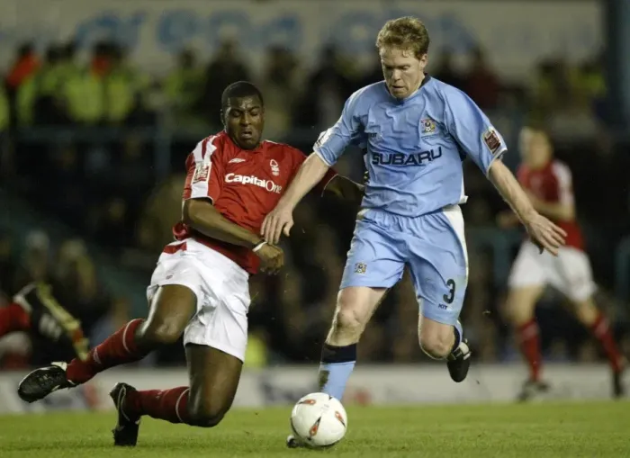 Framed Print : Clash at Highfield Road: Coventry City vs. Nottingham Forest - Steve Staunton vs. Wes Morgan in Championship Showdown (April 2005) Framed Print : Clash at Highfield Road: Coventry City vs. Nottingham Forest - Steve Staunton vs. Wes Morgan in Championship Showdown (April 2005)