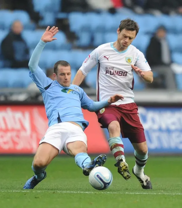 Framed Print : Clash of Leaders: Coventry City vs Burnley, Npower Championship - Michael Doyle vs Graham Alexander (2010) Framed Print : Clash of Leaders: Coventry City vs Burnley, Npower Championship - Michael Doyle vs Graham Alexander (2010)