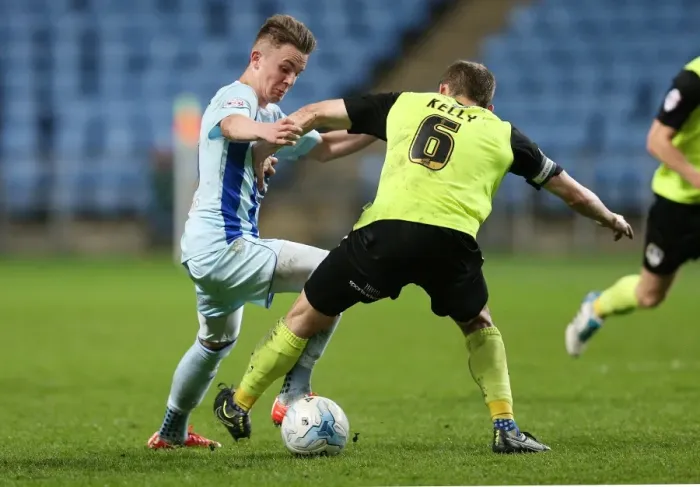 Framed Print : Clash of Midfield Maestros: James Maddison vs. Liam Kelly (Sky Bet League One) Framed Print : Clash of Midfield Maestros: James Maddison vs. Liam Kelly (Sky Bet League One)