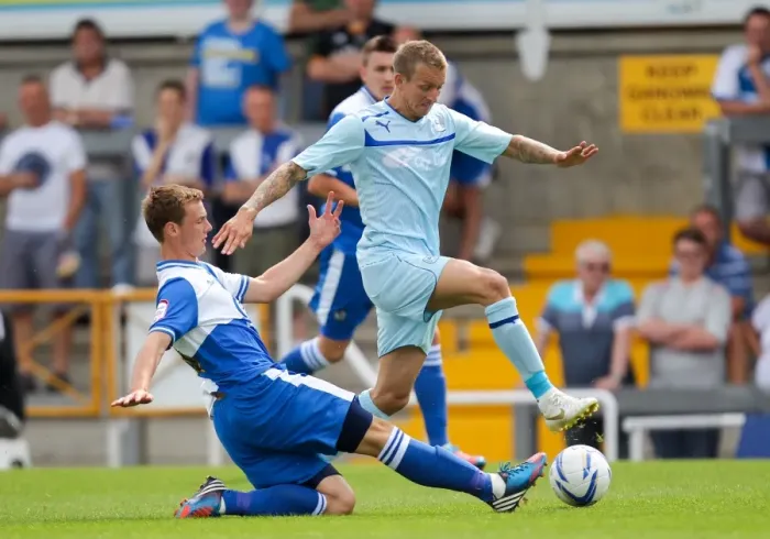 Framed Print : Clash of the Midfield Maestros: Seanan Clucas vs. Carl Baker at Memorial Ground Framed Print : Clash of the Midfield Maestros: Seanan Clucas vs. Carl Baker at Memorial Ground