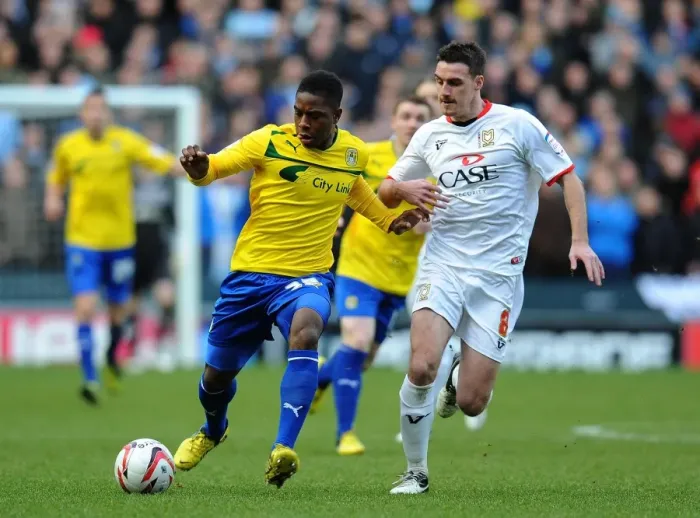 Framed Print : Clash of Midfield Titans: Potter vs. Moussa in Milton Keynes Dons vs. Coventry City (Npower League One, December 29, 2012) Framed Print : Clash of Midfield Titans: Potter vs. Moussa in Milton Keynes Dons vs. Coventry City (Npower League One, December 29, 2012)