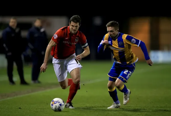 Framed Print : Clash on the Pitch: A Battle for Supremacy - Jordan Clarke vs. Samuel Ricketts (Sky Bet League One) Framed Print : Clash on the Pitch: A Battle for Supremacy - Jordan Clarke vs. Samuel Ricketts (Sky Bet League One)