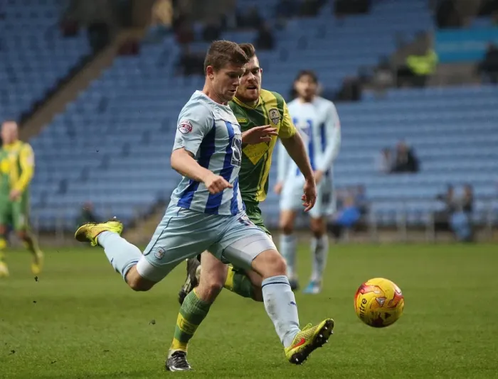 Framed Print : Clash at Ricoh Arena: Coventry City vs. Notts County in Sky Bet League One - Aaron Phillips vs. Ronan Murray