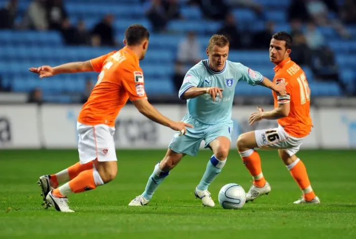 Framed Print : Clash at Ricoh Arena: Coventry City vs. Blackpool - Gary McSheffrey Faces Off Against Barry Ferguson and Neal Eardley Framed Print : Clash at Ricoh Arena: Coventry City vs. Blackpool - Gary McSheffrey Faces Off Against Barry Ferguson and Neal Eardley