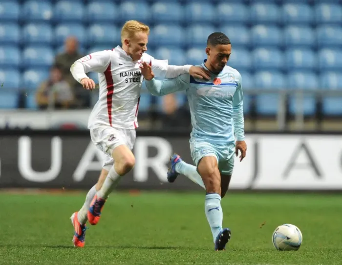 Framed Print : Clash at Ricoh Arena: Jordan Clarke vs Mark Duffy - Coventry City vs Scunthorpe United