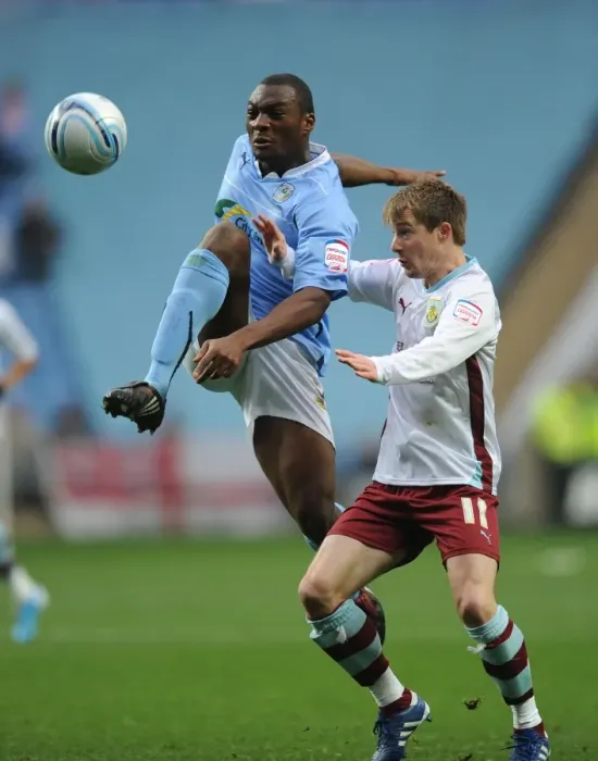 Framed Print : Clash at Ricoh Arena: Wade Elliott vs. Nathan Cameron - Coventry City vs. Burnley, Championship 2010 Framed Print : Clash at Ricoh Arena: Wade Elliott vs. Nathan Cameron - Coventry City vs. Burnley, Championship 2010