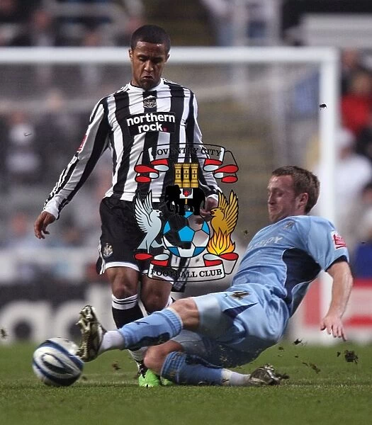 Clash at St. James Park: Coventry City vs. Newcastle United - Sammy Clingan Tackles Wayne Routledge in Championship Showdown (17-02-2010)