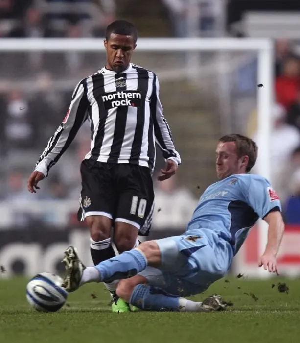 Framed Print : Clash at St. James Park: Coventry City vs. Newcastle United - Sammy Clingan Tackles Wayne Routledge in Championship Showdown (17-02-2010) Framed Print : Clash at St. James Park: Coventry City vs. Newcastle United - Sammy Clingan Tackles Wayne Routledge in Championship Showdown (17-02-2010)
