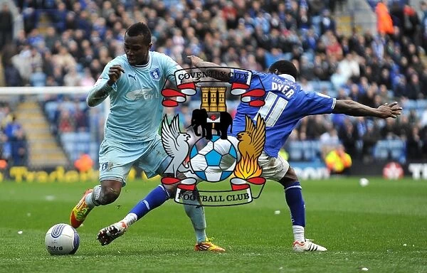 Clash of the Titans: Lloyd Dyer vs Alex Nimely in the Intense Npower Championship Showdown at The King Power Stadium (March 3, 2012)