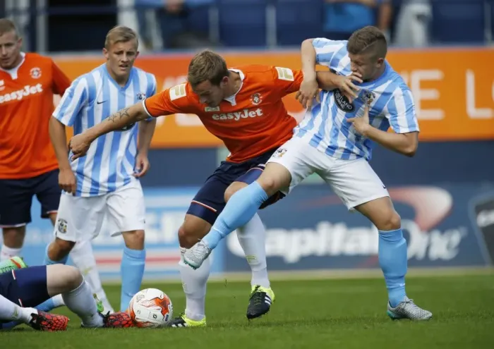Framed Print : Clash of Titans: Luke Wilkinson vs. Aaron Phillips in Coventry City's Pre-Season Friendly at Luton Town Framed Print : Clash of Titans: Luke Wilkinson vs. Aaron Phillips in Coventry City's Pre-Season Friendly at Luton Town