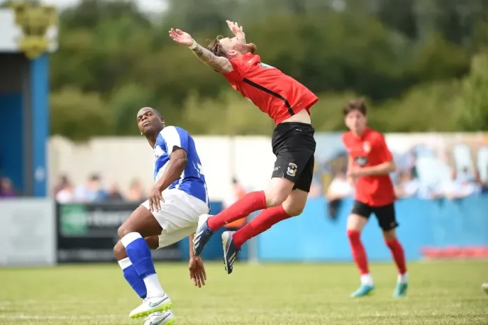 Framed Print : Clash of the Titans: Marlon Harwood vs. Romain Vincelot - Nuneaton Town vs. Coventry City Pre-Season Friendly Framed Print : Clash of the Titans: Marlon Harwood vs. Romain Vincelot - Nuneaton Town vs. Coventry City Pre-Season Friendly