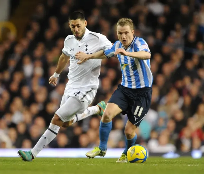 Framed Print : Clash at White Hart Lane: FA Cup Third Round Battle between Dempsey and McSheffrey Framed Print : Clash at White Hart Lane: FA Cup Third Round Battle between Dempsey and McSheffrey