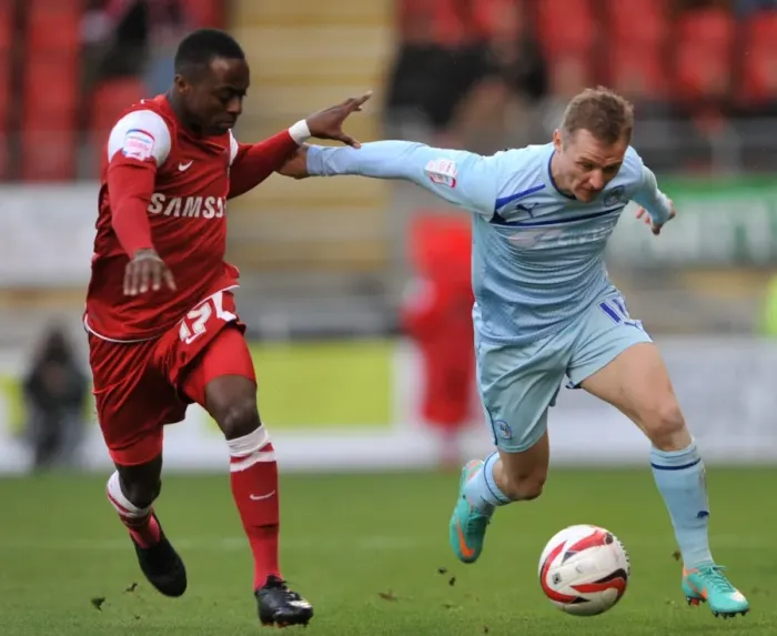 Framed Print : Clash of the Wings: McSheffrey vs. Odubajo in Coventry City's Npower League One Battle at Leyton Orient Framed Print : Clash of the Wings: McSheffrey vs. Odubajo in Coventry City's Npower League One Battle at Leyton Orient