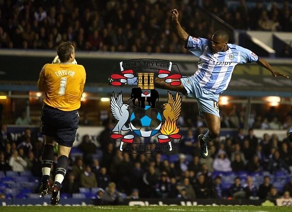 Clinton Morrison vs Maik Taylor: Intense Moment in Coventry City's Championship Clash at St. Andrews Stadium (03-11-2008)