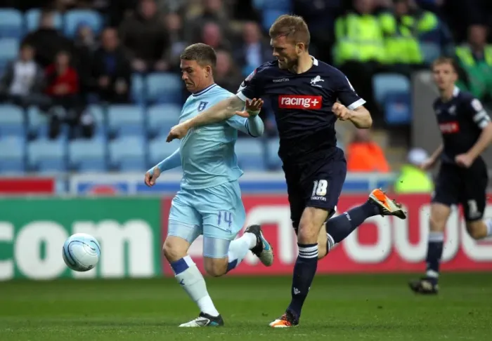 Framed Print : Cody McDonald vs Darren Ward: A Tight Tussle in Coventry City vs Millwall Npower Championship Match Framed Print : Cody McDonald vs Darren Ward: A Tight Tussle in Coventry City vs Millwall Npower Championship Match