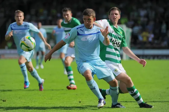 Framed Print : Cody McDonald's Determined Strike: Coventry City's Triumph over Yeovil's Richard Hinds (August 18, 2012) Framed Print : Cody McDonald's Determined Strike: Coventry City's Triumph over Yeovil's Richard Hinds (August 18, 2012)