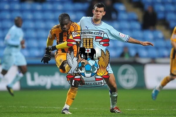 Conor Thomas vs. Aaron McLean: Intense Clash in Coventry City vs. Hull City, Npower Championship (10-12-2011, Ricoh Arena)